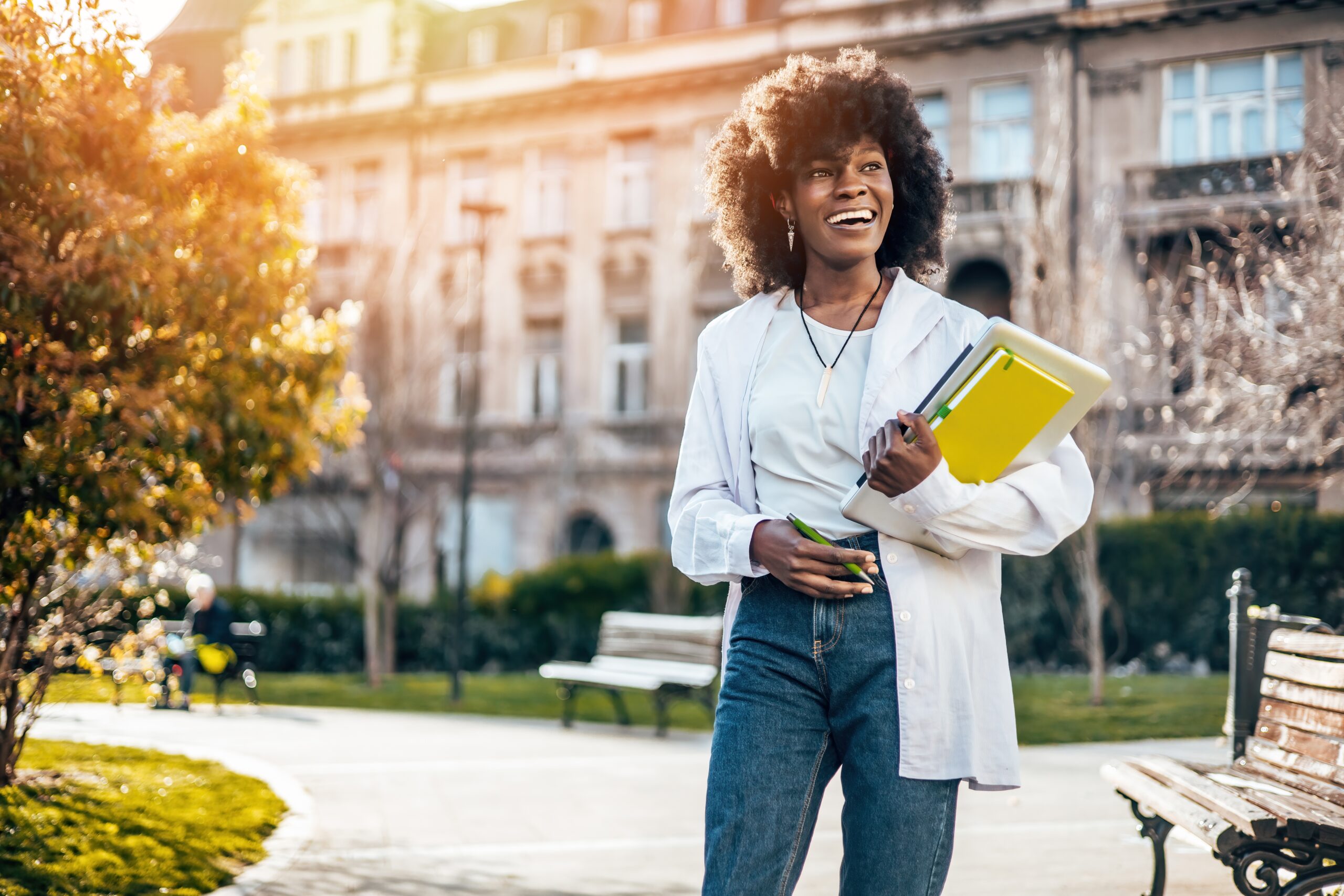 Beautiful,And,Happy,Black,Female,Student,Enjoying,Outdoors,In,College